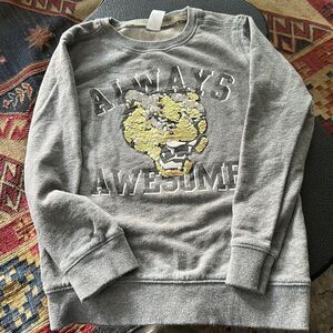 Gray sweatshirt with silver and gold lion/big cat logo - Always Awesome print